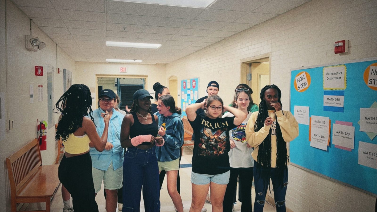 A SafeBAE chapter gathered in a school hallway