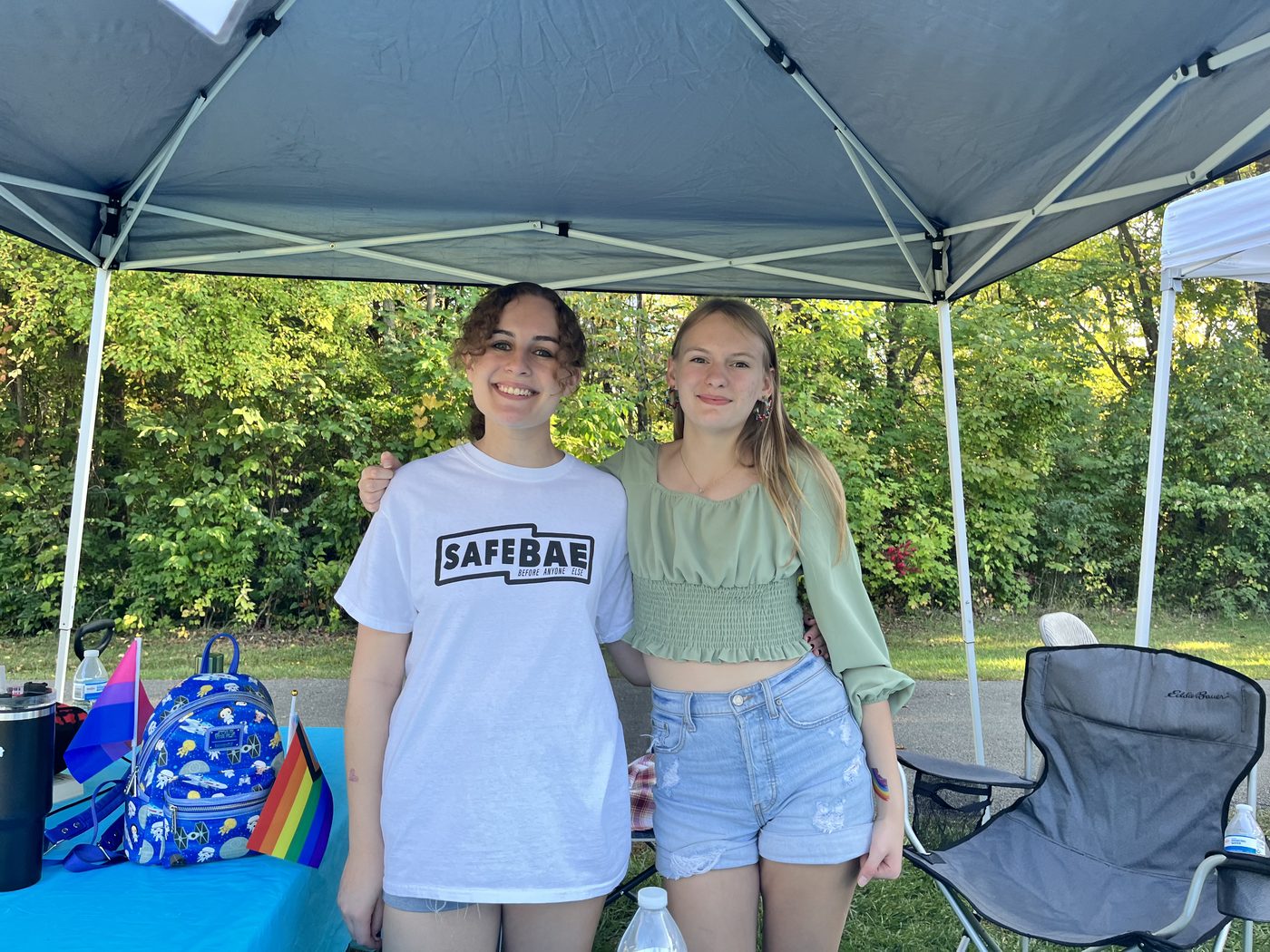Two SafeBAE club members tabling at a community event